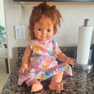 Chrissy Doll vintage hard to find. Has a lot of wear please see pictures.